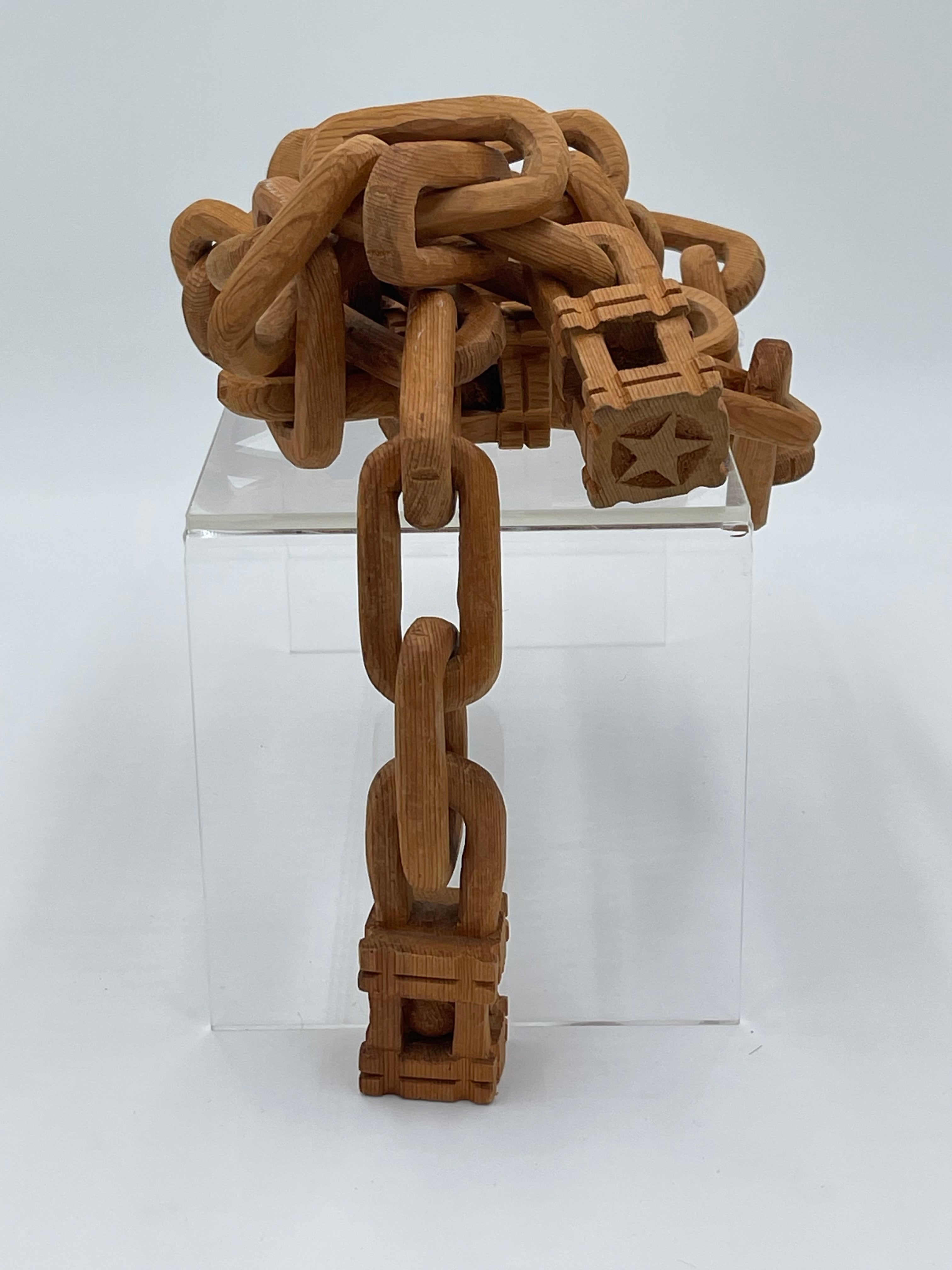 Folk art wood chain carved continuously