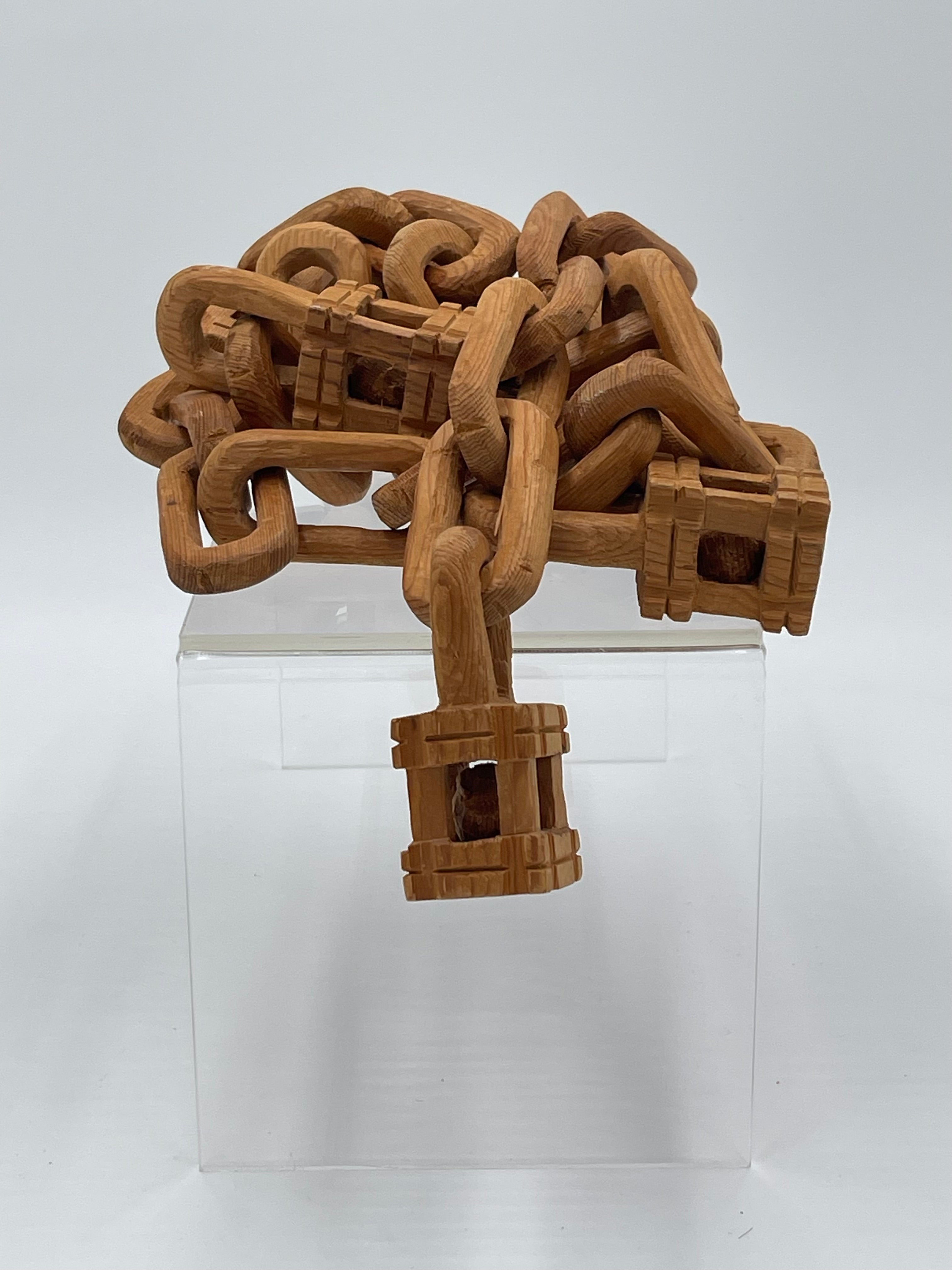 Folk art wood chain carved continuously