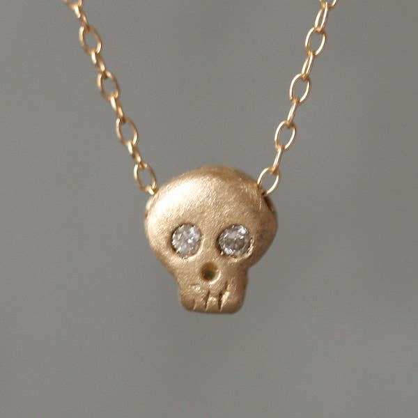 BABY SKULL NECKLACE IN 14K GOLD WITH GEMSTONES