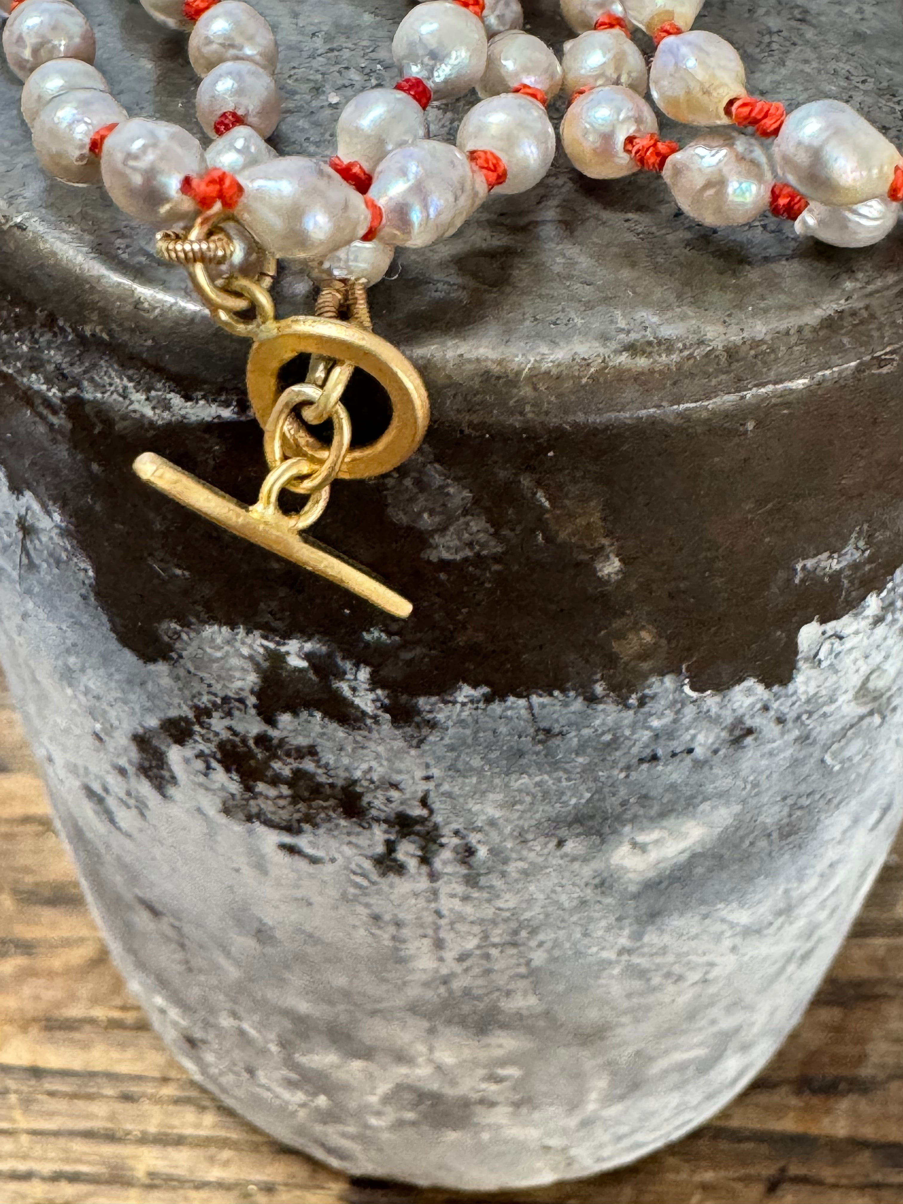 Akoya Grey Pearl + Coral Silk Necklace by Carla Morrison