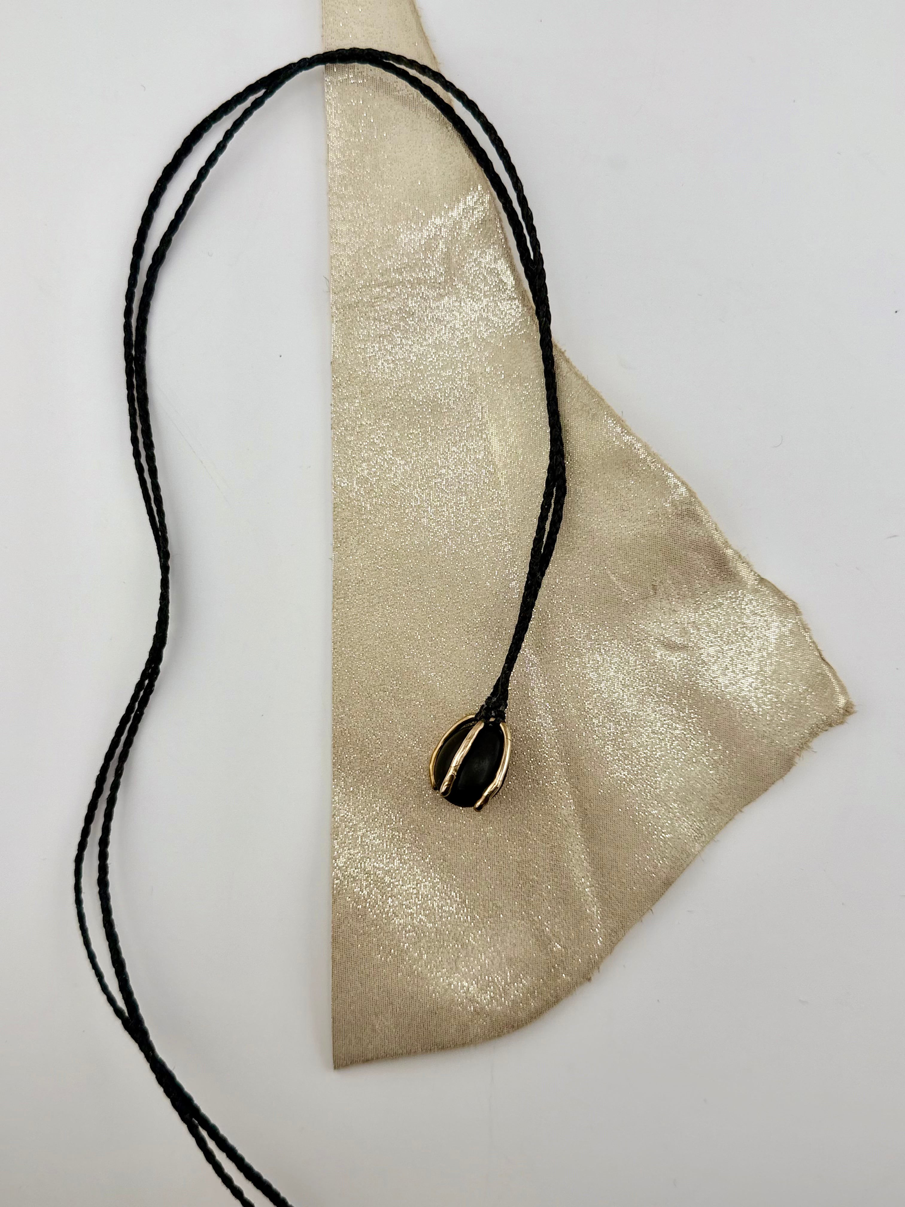 Small Bronze Cage Japanese Beach Pebble Necklace by Carina Schott