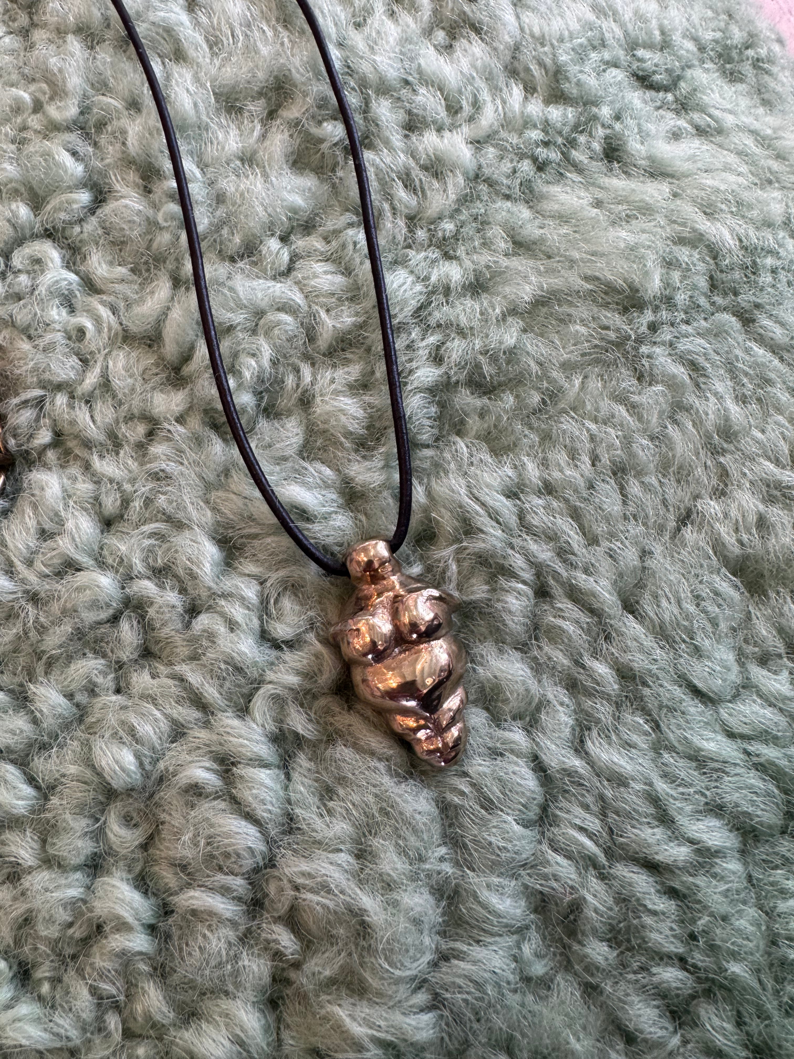 Venus of Willendorf Bronze on Leather Cord by Carina Schott