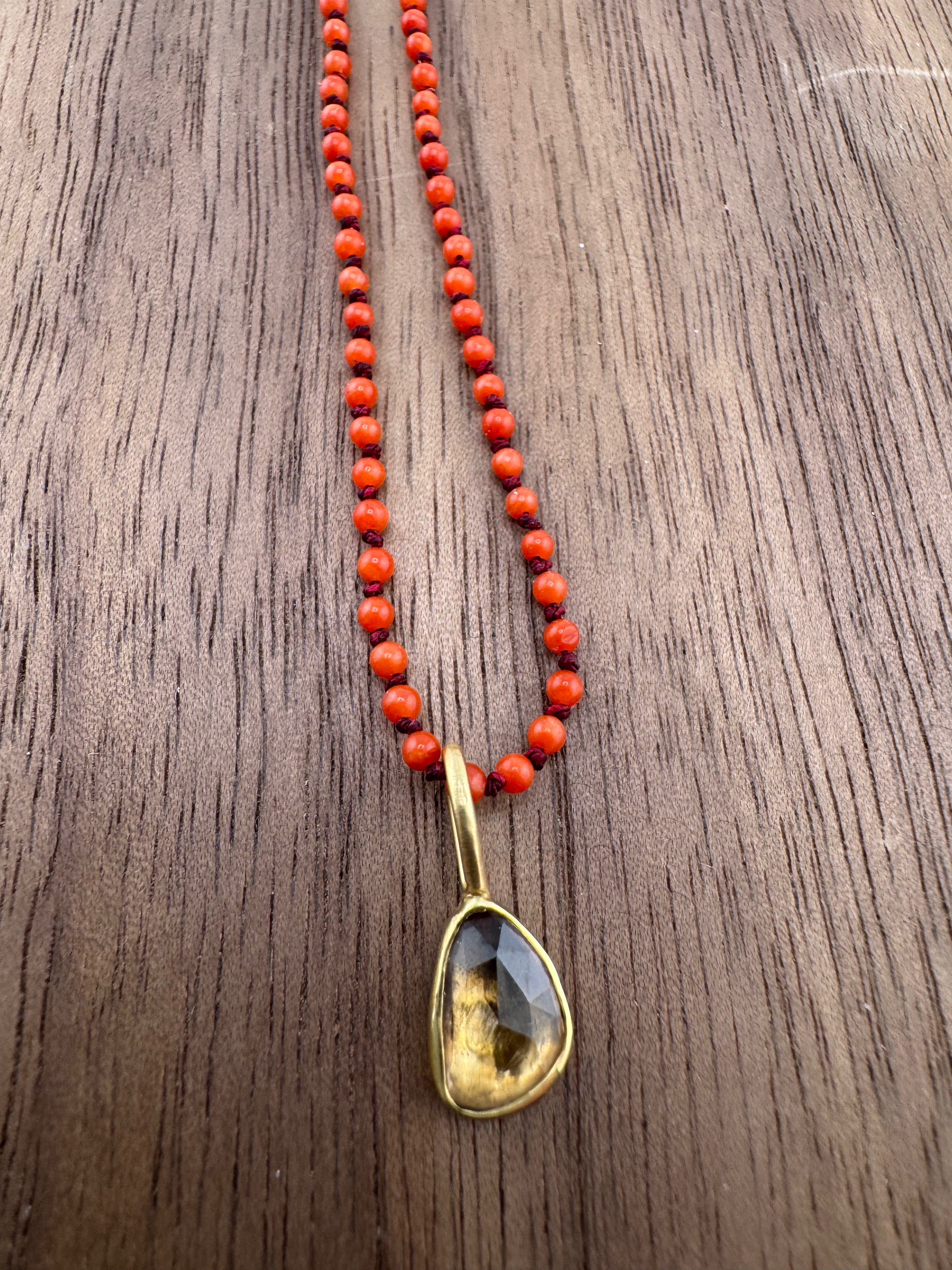 Coral, 18K, and Saphire Necklace by April Higashi