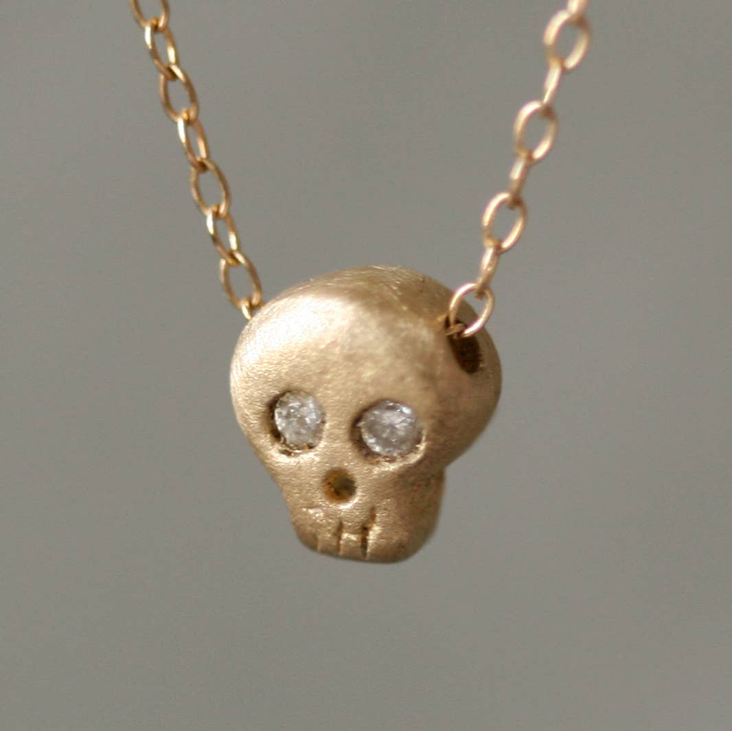 BABY SKULL NECKLACE IN 14K GOLD WITH GEMSTONES